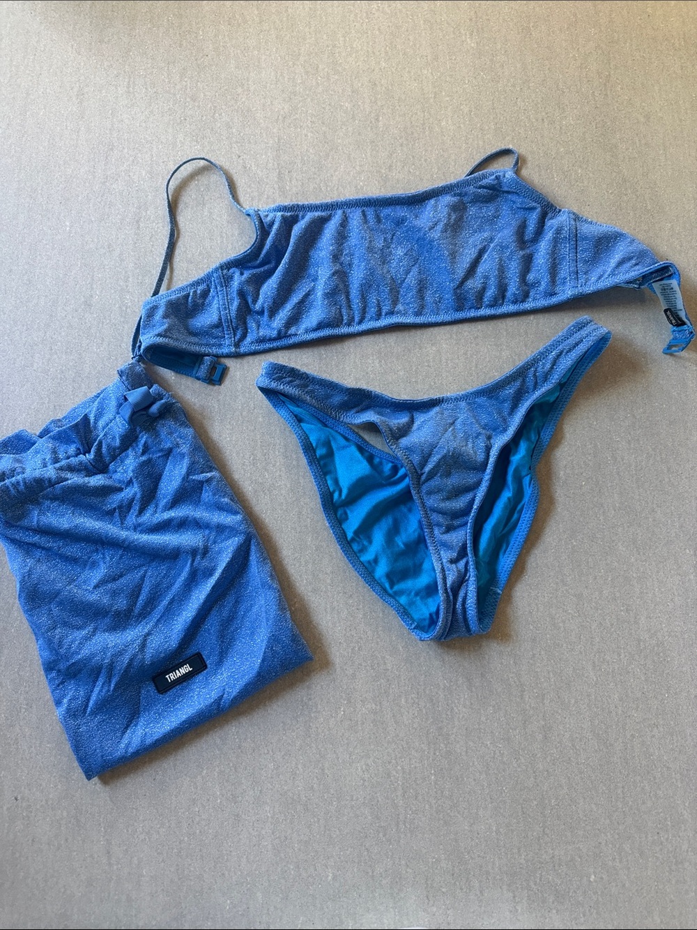 triangl swimwear blue textured bikini set with pouch